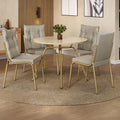 Conjunto de jantar Lisboa com mesa redonda off white e 4 cadeiras estofadas, ambientado com tapete redondo e planta