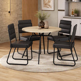 Conjunto de jantar San Francisco com mesa redonda off white e 4 cadeiras em napa preta, ambientado com tapete redondo