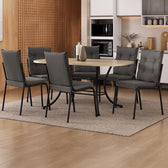 Conjunto de jantar Madrid com mesa retangular off white e 6 cadeiras estofadas, ambientado com tapete e vaso de planta