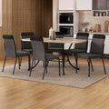 Conjunto de jantar Quebec com mesa retangular off white e 6 cadeiras estofadas, ambientado com tapete e vasos sobre a mesa